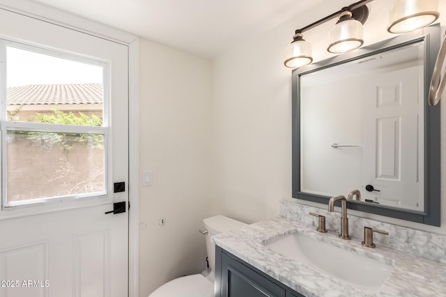 7702 W Piute Ave, Glendale, AZ 85308 - bathroom featuring vanity and toilet