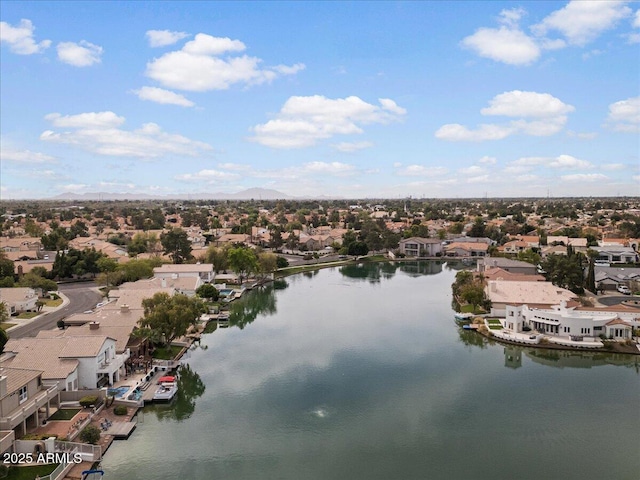 aerial view featuring a residential view and a water view