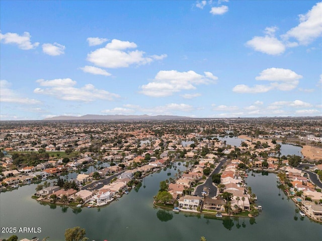 aerial view with a residential view and a water and mountain view