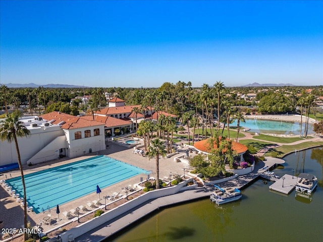 birds eye view of property featuring a water view