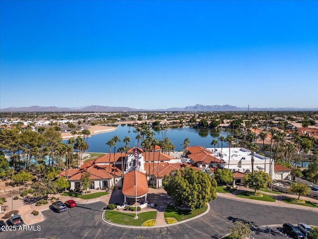 aerial view with a residential view and a water and mountain view