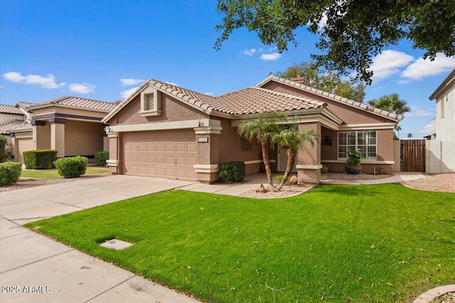 mediterranean / spanish-style house with stucco siding, an attached garage, driveway, a tiled roof, and a front lawn