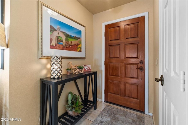 foyer with tile patterned floors