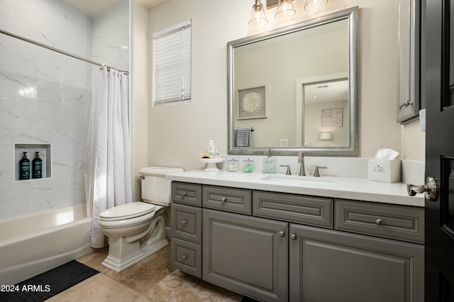 full bathroom with tile patterned floors, vanity, shower / tub combo, and toilet