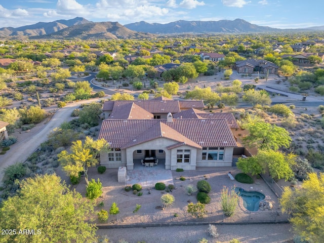birds eye view of property with a residential view and a mountain view