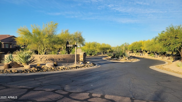 view of street featuring curbs