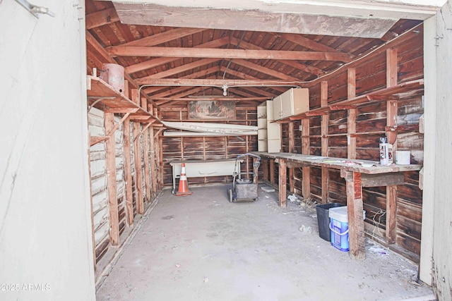 interior space featuring vaulted ceiling