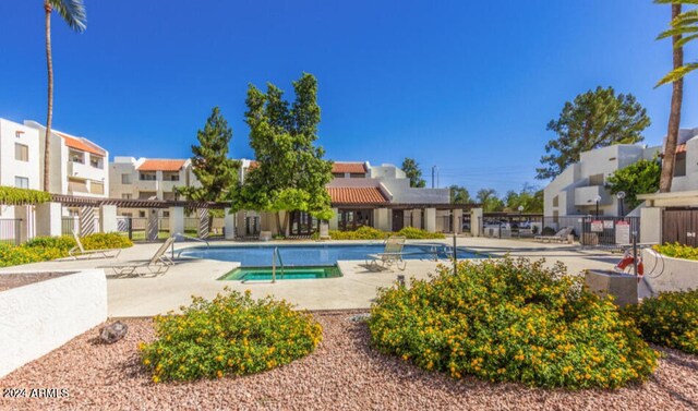 view of pool featuring a patio area