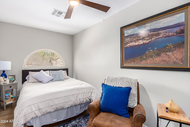 bedroom featuring ceiling fan and hardwood / wood-style flooring