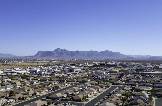 birds eye view of property featuring a mountain view