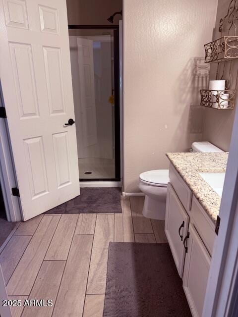 10335 W Pima St, Tolleson, AZ 85353 - full bath featuring vanity, a shower stall, and wood tiled floors