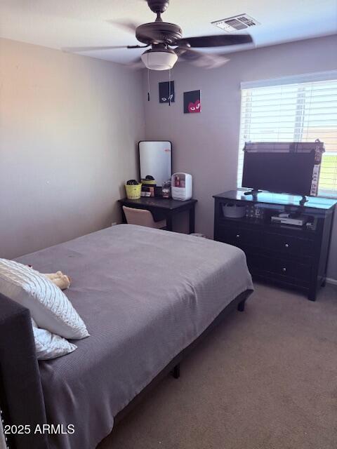 10335 W Pima St, Tolleson, AZ 85353 - bedroom with ceiling fan and carpet