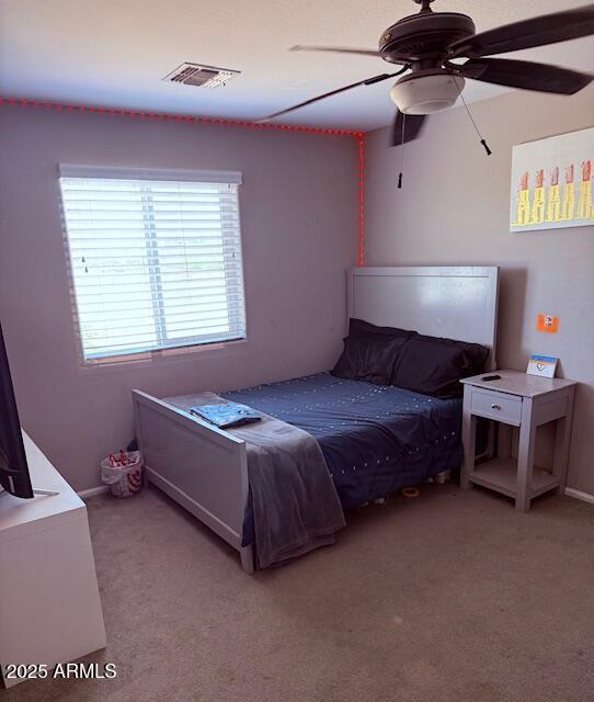 10335 W Pima St, Tolleson, AZ 85353 - carpeted bedroom featuring ceiling fan