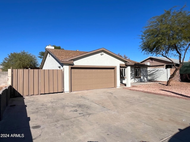 ranch-style house with a garage