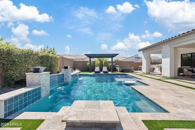 view of pool featuring a fenced backyard, a fenced in pool, a patio, and a hot tub
