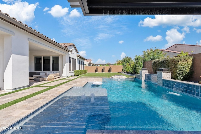 view of pool featuring a fenced backyard, a fenced in pool, and a patio area