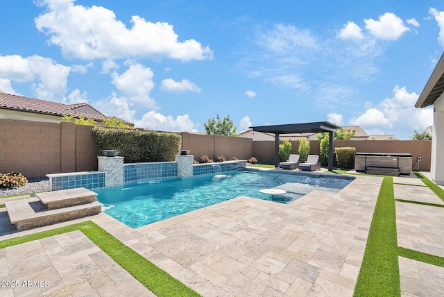 view of swimming pool featuring a hot tub, a patio, a fenced in pool, and a fenced backyard