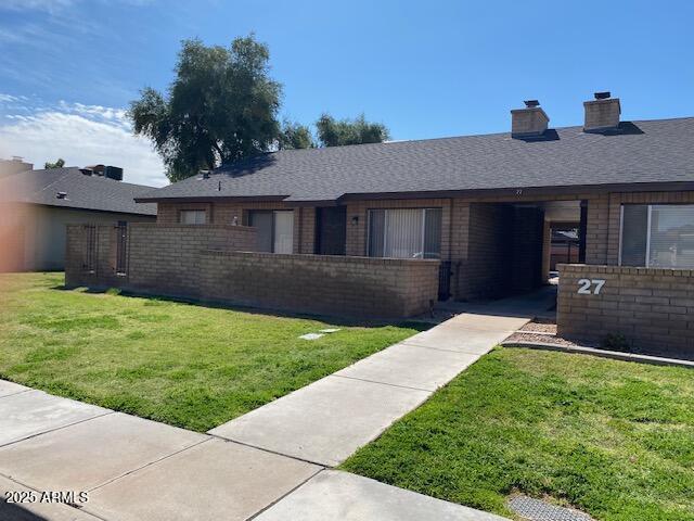 27 W Concorda Dr Unit 104, Tempe, AZ 85282 - single story home featuring brick siding and a chimney