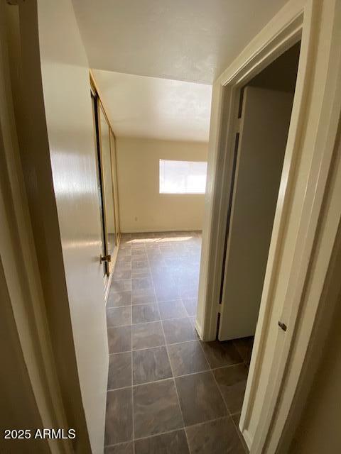 27 W Concorda Dr Unit 104, Tempe, AZ 85282 - corridor with dark tile patterned flooring