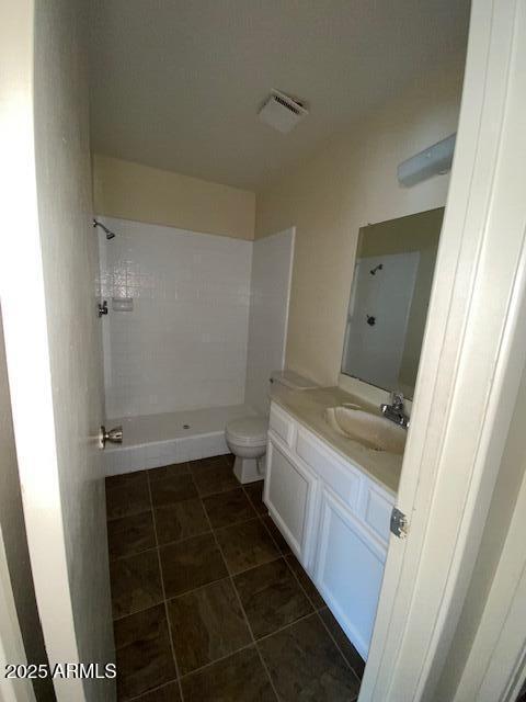 27 W Concorda Dr Unit 104, Tempe, AZ 85282 - bathroom with a shower, vanity, toilet, and tile patterned floors