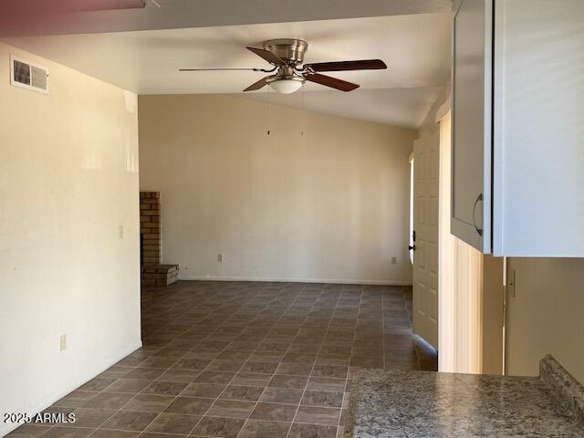 27 W Concorda Dr Unit 104, Tempe, AZ 85282 - spare room featuring vaulted ceiling and ceiling fan