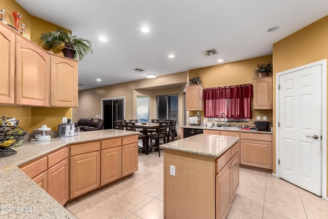 kitchen with light tile patterned flooring, light brown cabinets, visible vents, and recessed lighting