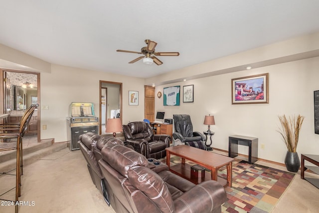 living room with ceiling fan and light carpet