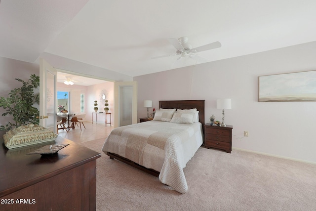 bedroom with light carpet, a ceiling fan, and baseboards