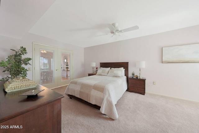 bedroom featuring ceiling fan, access to outside, french doors, and light colored carpet