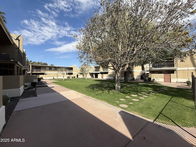 4615 N 22nd St Unit 113, Phoenix, AZ 85016 - view of community featuring a lawn