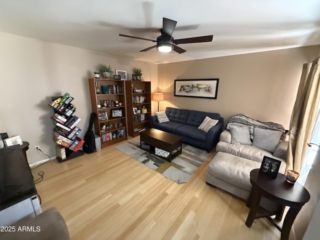 4615 N 22nd St Unit 113, Phoenix, AZ 85016 - living area featuring a ceiling fan and wood finished floors