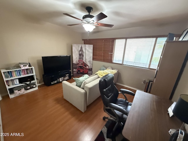4615 N 22nd St Unit 113, Phoenix, AZ 85016 - home office with wood finished floors and ceiling fan