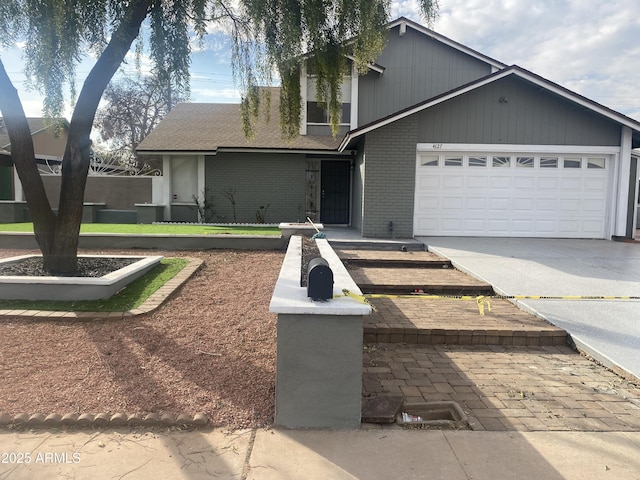 view of front of home with a garage