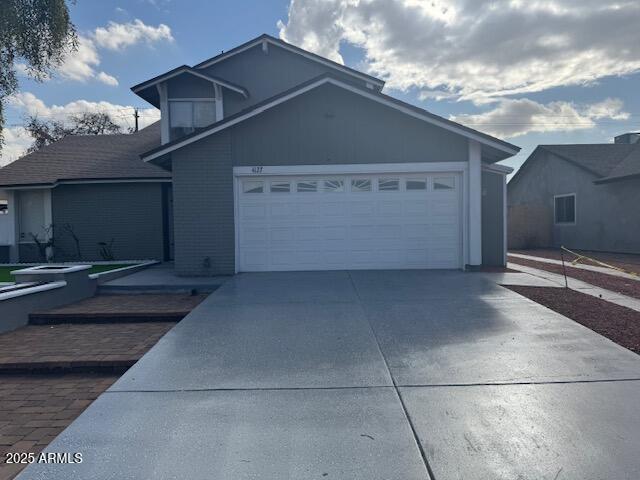 view of front of property with a garage