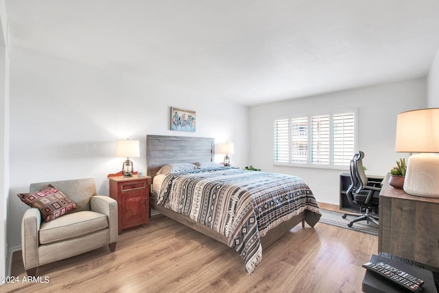 bedroom featuring light hardwood / wood-style floors