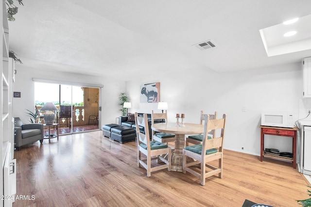 dining room with light hardwood / wood-style floors