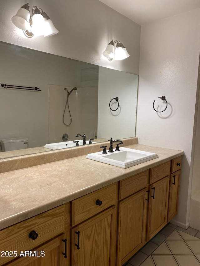 full bathroom with vanity, washtub / shower combination, and toilet