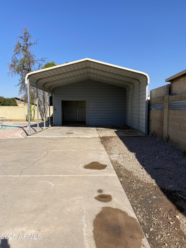 garage featuring a carport