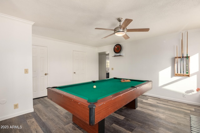 playroom with billiards, ornamental molding, ceiling fan, and dark hardwood / wood-style floors