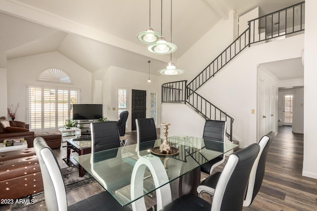 dining space with high vaulted ceiling, beam ceiling, and dark hardwood / wood-style floors