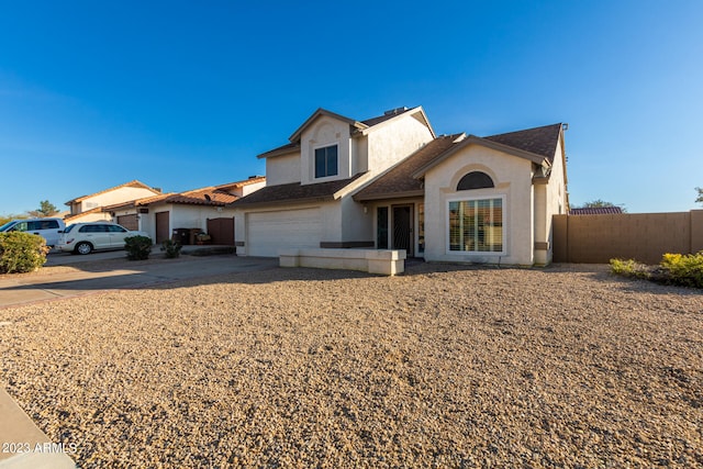 view of front of home with a garage