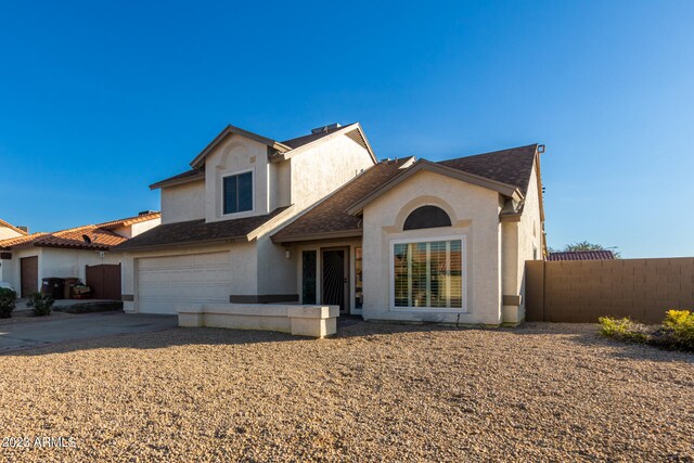 view of front of home with a garage