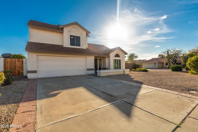 view of front of property featuring a garage