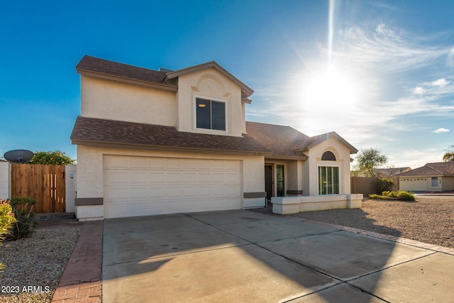 front of property with a garage