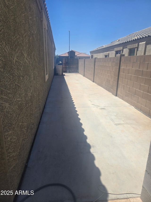 9302 W Georgia Ave, Glendale, AZ 85305 - view of patio / terrace with a gate