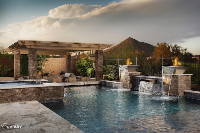 view of pool featuring pool water feature