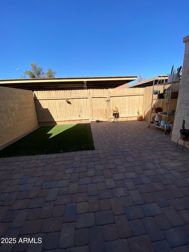 view of patio / terrace with fence