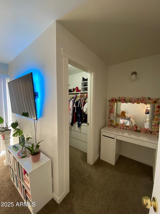 interior space with dark colored carpet