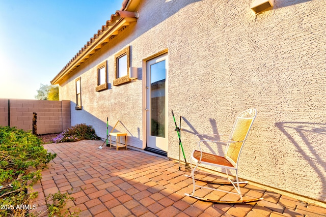 view of patio with fence