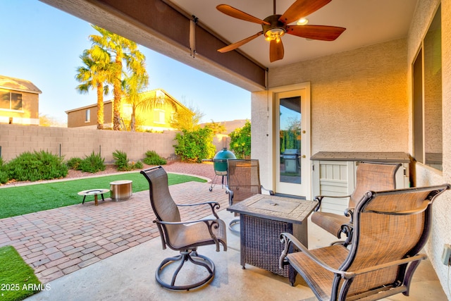 view of patio / terrace with a grill, a fenced backyard, and ceiling fan